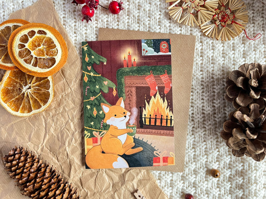 A6 Christmas Greeting Card with envelope - Fox sipping tea by the cozy Chimney Fire